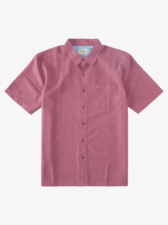 Take a trip into cool comfort with our Centinela Short Sleeve Button Up! Made with wrinkle and sweat-resistant polynosic polyester fabric, this shirt takes your travel style up a notch with its sand-washed texture, moisture-wicking technology, and pick-edge stitching. Plus, its slouchy fit and contrasted inner yoke panel give your wardrobe a bleached-out edge—we guarantee you’ll look (and feel!) super fly!     EQMWT03150