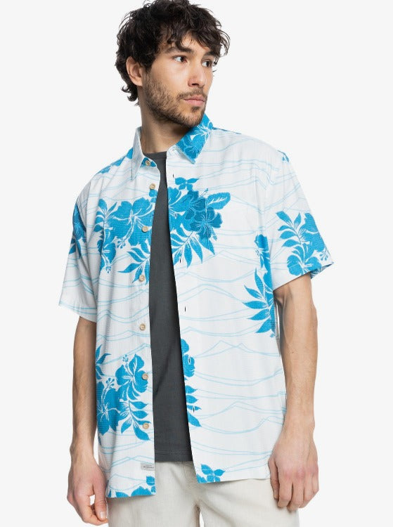 Make some waves in this Ocean Floral Short Sleeve Button Up! Crafted with premium cotton-rich fabric and sand washed for a smooth feel, this classic-fit shirt is perfect for all your outdoor adventures. Featuring embroidered details, a chest pocket, and coconut buttons, you'll be sure to put a little sunshine in everyone's day!    EQMWT03418
