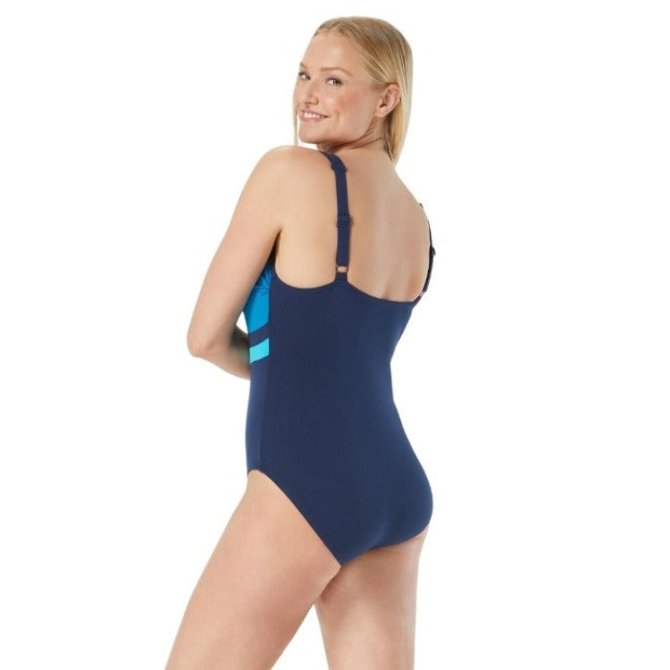 V-Neck One Piece Swimsuit offers UV 50+ Protection, Tummy Control Panels, Soft Cups for Support, Adjustable Straps, Gripped Silicone Strip, Ultra Conservative Leg Cut, Full Bottom Coverage and Quick Drying. Bold blue top, navy bottom and teal stripe enhance curves. Perfect for aquafit and lane swim!
