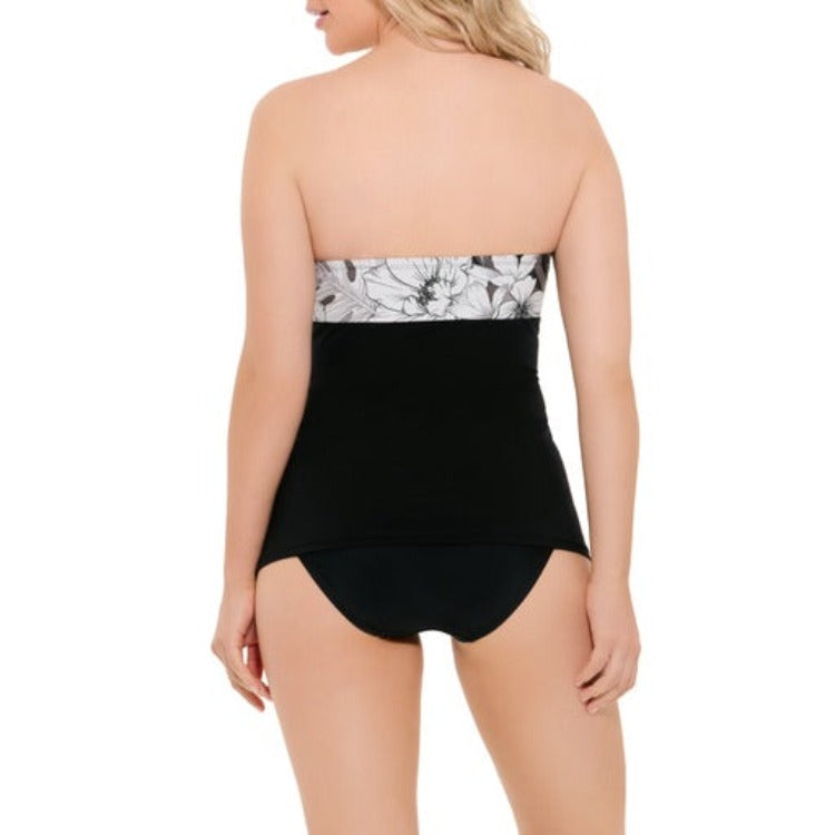 Look stunning in this Twist Tankini! You'll feel confident in the sweetheart neckline and removable, adjustable straps, plus the molded cup and shirred top provide the perfect silhouette. The tummy-taming black side panels will have you looking smokin' hot, while the non-slip lining on the top lets you take it strapless. Get ready to show off your curves in this twist of a tankini!