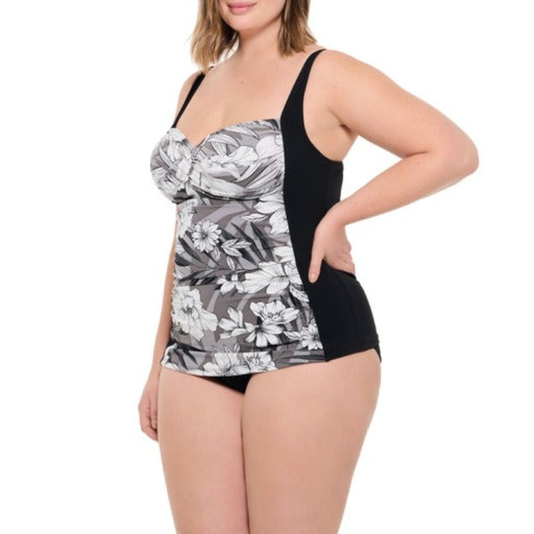 Flaunt your curves with ease in this super flattering Twist Front D-Cup Tankini! Show off your hourglass figure with slimming paneling and tummy-taming technology. Wide straps and a mid-rise brief keep you comfortable and secure, while the sweetheart neckline adds a seductive twist. Rock that D-cup in style!