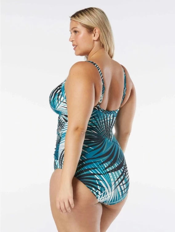 Feel confident and supported on the beach with the Coco Reef Enrapture D Cup One Piece! This stylish swimsuit is designed with a flattering fit and push up construction to give you curves for days with the perfect amount of tummy control. With adjustable straps, an underwire and a hidden closure for extra support, you can be sure to make a splash!