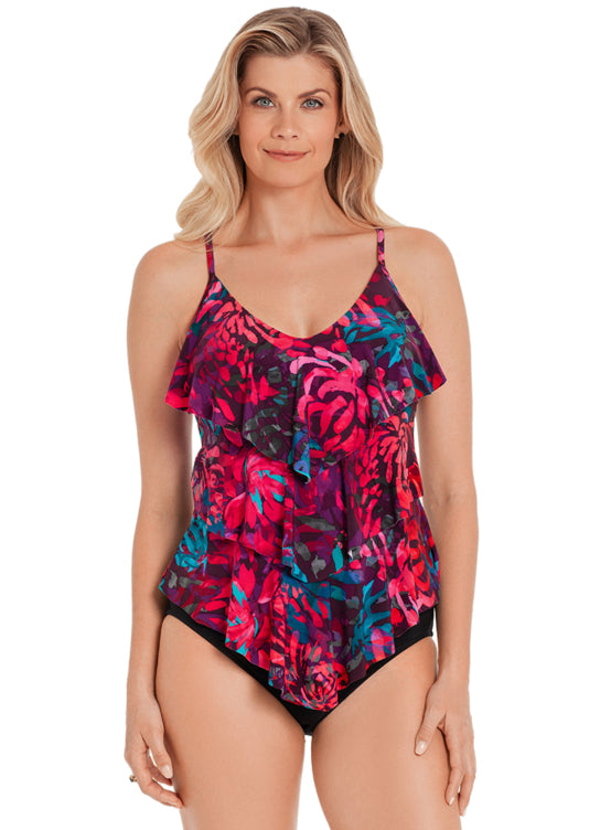 Head to the beach with confidence wearing the Rita Tankini from Magicsuit Oasis! This classic tankini is triple-tiered to slim down any figure, and adjustable straps lead to a full straight back. With gorgeous shades and a stunning print of palms and florals designed to camouflage any flaw, you'll be ready to soak up the sun in style and comfort. Plus, it's made with MAGITEX® fabric for allover slimming control and can accommodate up to a D-cup! Tres chic!