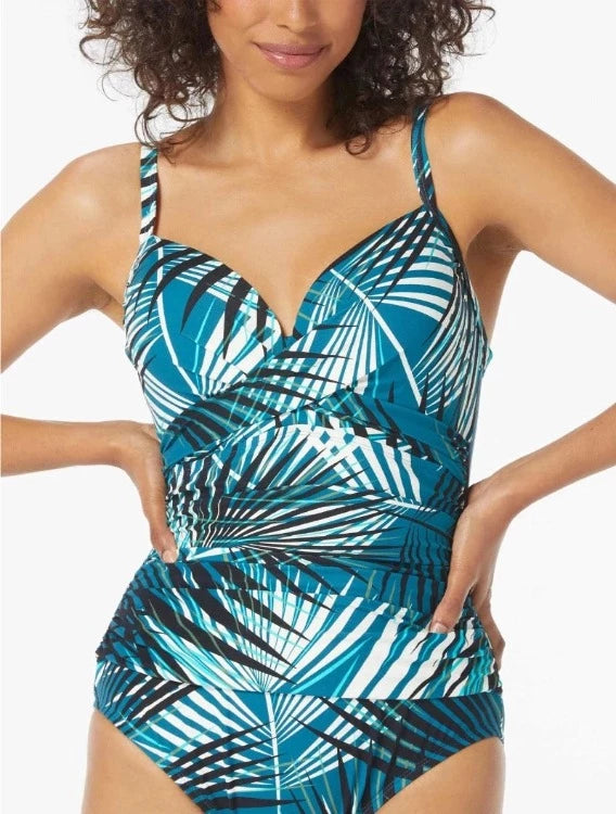 Feel confident and supported on the beach with the Coco Reef Enrapture D Cup One Piece! This stylish swimsuit is designed with a flattering fit and push up construction to give you curves for days with the perfect amount of tummy control. With adjustable straps, an underwire and a hidden closure for extra support, you can be sure to make a splash!