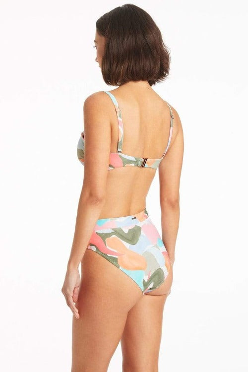 Discover a secret world of underwater beauty in this Painted Ball Bandeau Bikini. Escape from reality and explore the bright and vibrant hand-painted pastel design. The versatile top features removeable cookies, adjustable straps - which can be removed or converted to your liking - and side boning with foam and powermesh support for the perfect fit. Meanwhile, the high-waisted bottoms with a high-cut leg line are sure to make you look your sea-sational best. Aloha!    SL3074PB/4535PB