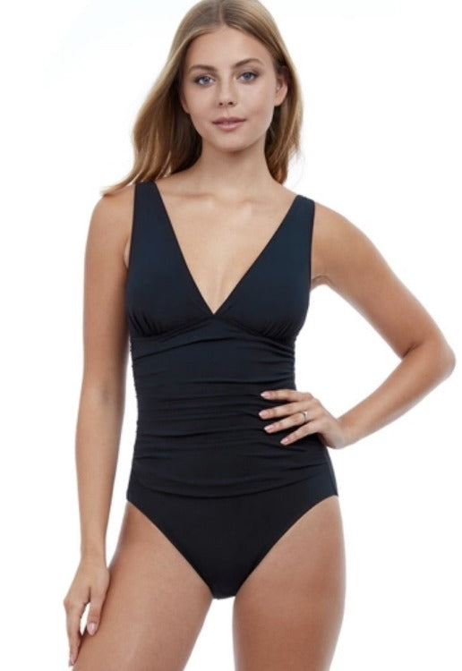 Look your best in the Tutti Frutti Deep V One Piece! Show off your curves with this stylish swimsuit that sculpts and slims your profile with ruching and adjustable straps. Plus, you'll be protected from the sun in its UV protection lycra that feels like a comfy second skin. A touch of sex appeal with a deep v-neck? Yes, please! Time to take your pool look to the next level.    ETT2144