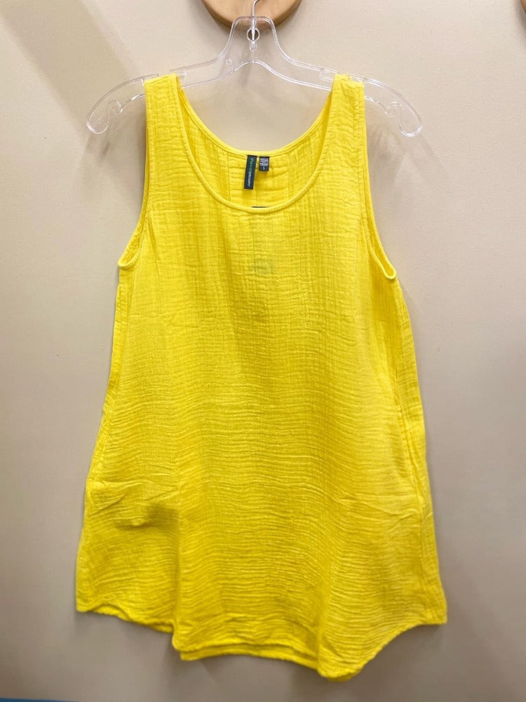 Dress to impress this season with our Nancy Tank Dress! This stylish tee dress features a tank style top and side pockets for added convenience. Show off your summer style and don't forget to bring your essentials! Everything you need, all in one dress.      5067