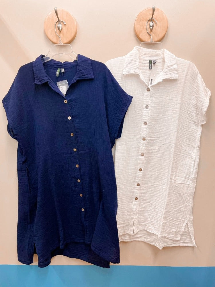 Enjoy comfort and convenience with the Shannon Passero Shirley Dress! Made with lightweight, gauze cotton for a breezy feel, this button-down dress features chic pockets for your essentials. It's the perfect mix of style and functionality!         1028