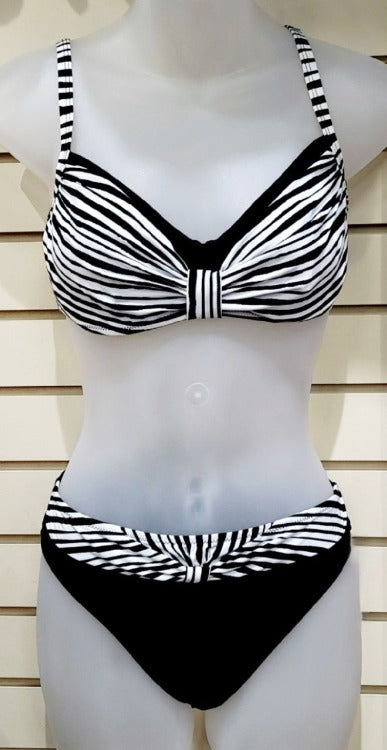 Be wild in the sun with this exotic Profile D-cup bikini set! The zebra print and adjustable straps make it perfect for your next sun-drenched safari. Not to mention the underwire support and moderate coverage that will let you show off without showing too much! Live life on the wild side - and be the envy of the beach.    E4161D71/4161P94