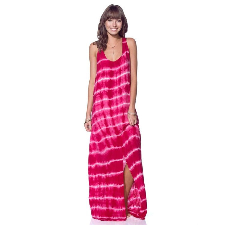 This Maaji Stop and Listen Maxi Dress Cover Up is the coolest way to make a splash -- featuring a tie-dye pattern, cross over back straps, and a knee-length front slit, it's got all the vibes colombians could ever want! Plus, it's totally 100% Viscose, so it's soft and comfy to boot.