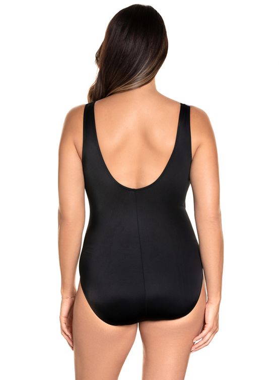 Slip into the Tulum Ruffle One Piece and feel the luxurious soft cup bra nestled comfortably against your skin. This gorgeous one piece features a chic V-Neckline, fixed straps, and a scoop back. Show off your curves with a moderate leg cut, perfect for a day in the sun or a night by the pool! Who says you can't have it all?