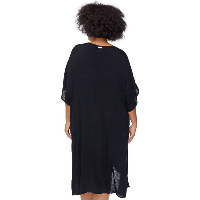 Elevate your beach style to the next level with the Paraiso Curve Cover Up! Float through summer days in the breezy, beautiful beach cover up, designed with a high-low hem, twist front detail, 3/4 sleeves, semi-sheer fabric and a plunge v-neck. Make a statement and embrace a blissful boho style--it's time to dare!     J840094R+